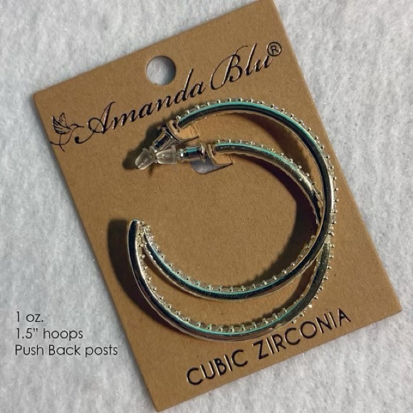 Amanda Blu®
Silver Gold Cubic Zirconia Inside-Out Hoop Earrings - Picture 2 of 7